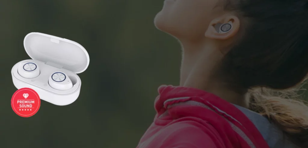 girl in pink shirt wearing BeatBuds Pro